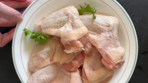 Raw chicken wings poultry meat lunch or dinner tasty snack fresh food Stock Footage 335651241