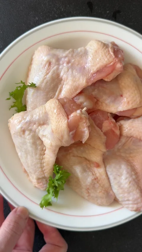 Raw chicken wings poultry meat lunch or dinner tasty snack fresh food Stock Footage 335651242