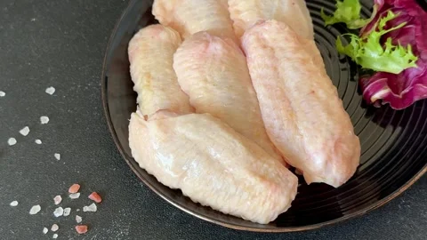 Raw chicken wings poultry meat lunch or dinner tasty snack fresh food Stock Footage 335651244