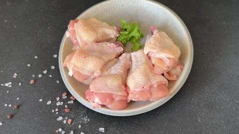 Raw chicken wings poultry meat lunch or dinner tasty snack fresh food Stock Footage 335651245