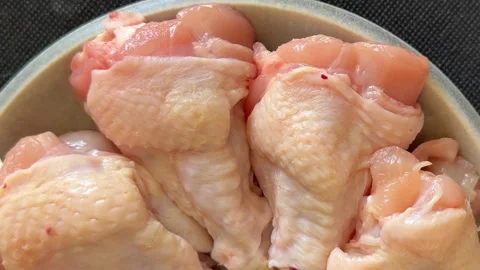 Raw chicken wings poultry meat lunch or dinner tasty snack fresh food Stock Footage 335651250