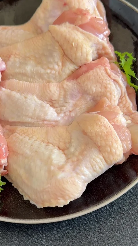 Raw chicken wings poultry meat lunch or dinner tasty snack fresh food Stock Footage 335651256