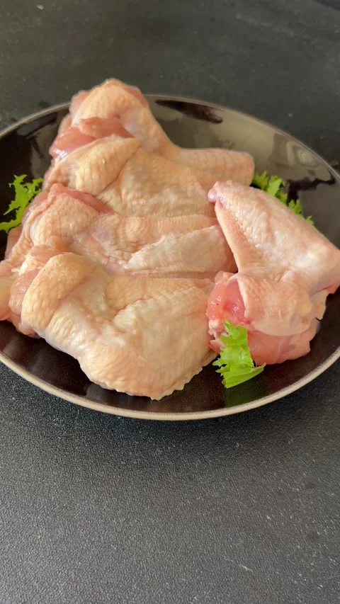 Raw chicken wings poultry meat lunch or dinner tasty snack fresh food Stock Footage 335651258