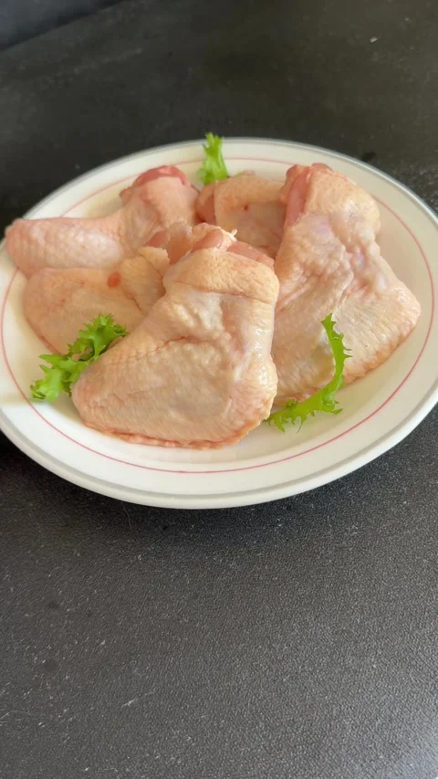 Raw chicken wings poultry meat lunch or dinner tasty snack fresh food Stock Footage 335651259