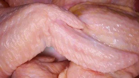 Raw chicken wings rotating seamless looping food texture pattern close up Stock Footage 103087080