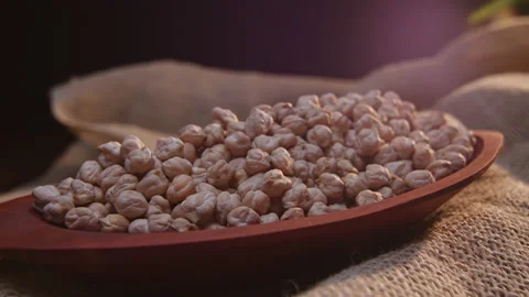 Raw chickpeas in a container Stockbeeldmateriaal 131453314