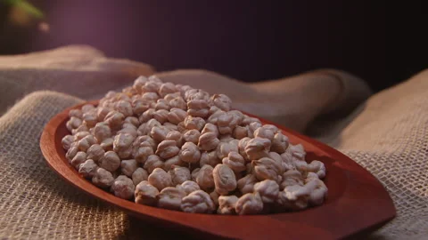 Raw chickpeas in a container Stockbeeldmateriaal 131455214