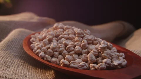 Raw chickpeas in a container Stockbeeldmateriaal 131465018