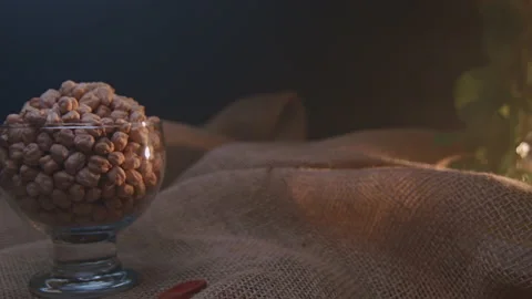 Raw chickpeas in a container Stockbeeldmateriaal 131465603