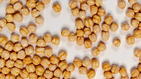 Raw chickpeas on white background, horizontal format, top view Stock Footage 336471736