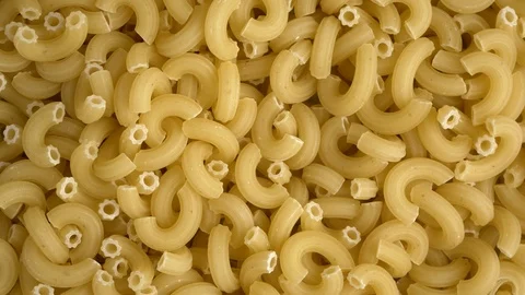 Raw Chifferi Pasta Overhead Rotating Stock Footage 85734668