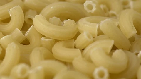 Raw Chifferi pasta rotating. Shallow depth of field. Stock Footage 85734338