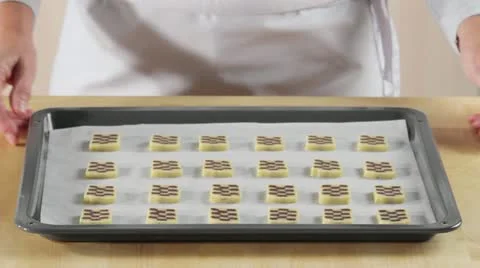 Raw chocolate and vanilla biscuits on a baking tray Stock-Footage 24662967