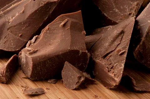 Raw chocolate chunks Stock Photos