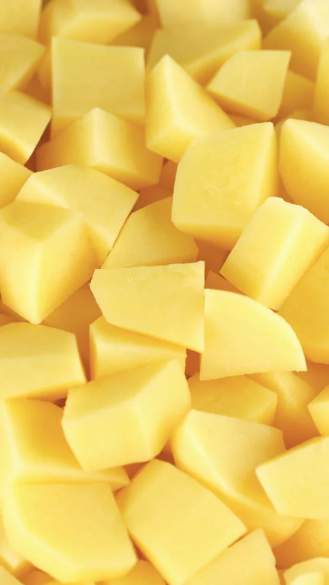 Raw chopped potatoes close up, rotation Video stock 300339473