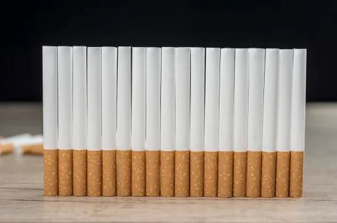 Raw of cigarettes background Stock Photos