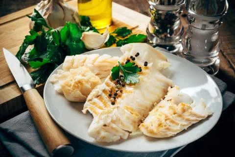 Raw codfish fillet Stock Photos