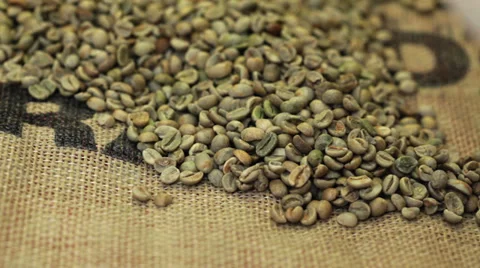 Raw coffee beans at coffe sack Stock Footage 35852084
