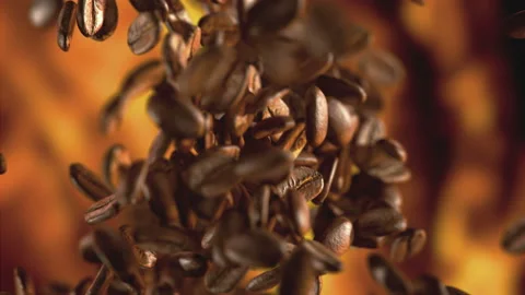 Raw coffee beans flying on the fire Stock-Footage 123481876