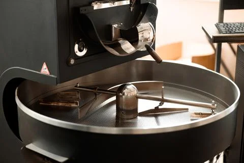 Raw coffee testing before roast Stock Photos