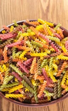Raw colored pasta Stock Photos