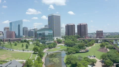 RAW COLORS-Aerial pulling back from Richmond Virginia Skyline over the water Stock Footage 160938735