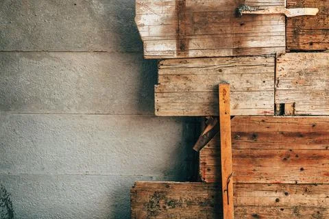 Raw concrete wall texture combined with wooden shuttering panels. Concept o.. Stock Photos