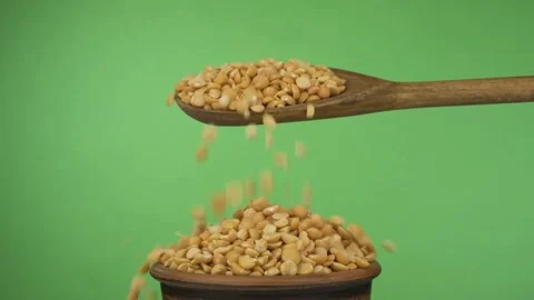 Raw corn seed Yellow maize grains on a delicious background on wooden spoon Stock Footage 336581434