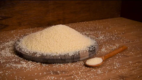 Raw couscous Video stock 129398941