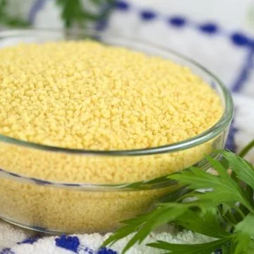 Raw couscous Stock Photos