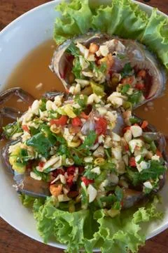 Raw crab in fish sauce spicy salad Stock Photos