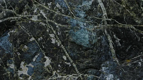 Raw cracked black stone texture 스톡 동영상 137057320