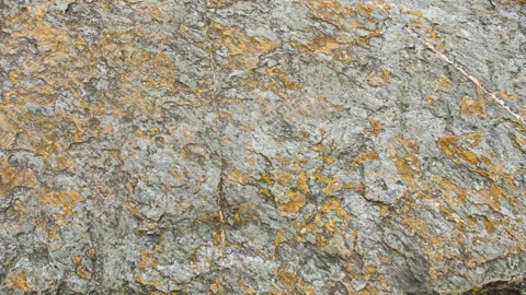 Raw cracked gray stone texture 스톡 동영상 137036191