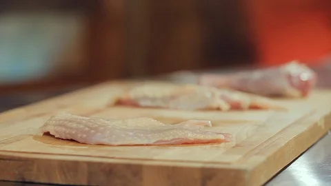 Raw cut chicken fillet on the cutting board Stock Footage