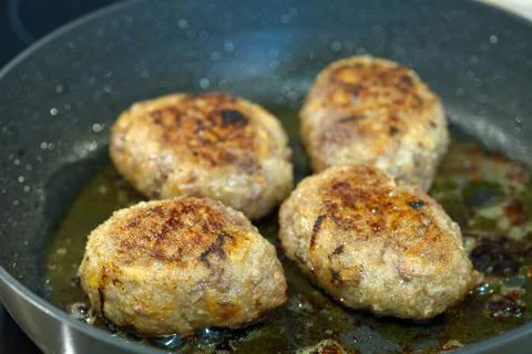 Raw cutlets made of ground beef meat. coocking process Stock Photos