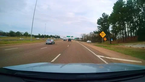 Raw dash camera footage shows vehicles on Interstate 55  in Jackson, Mississippi Stock Footage 329259282