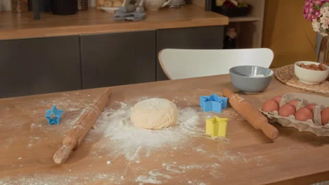 Raw Dough with Baking Tools Lying on Table for Family Cooking Stock Footage 336947282