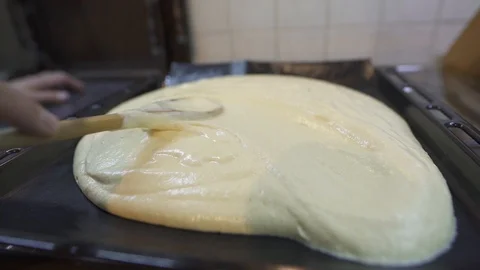 Raw dough in the pan Stock Footage 127095499