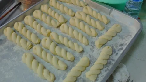 Raw Dough Pastries Prepared for Baking at Thai Night Market Stock Footage 324861668
