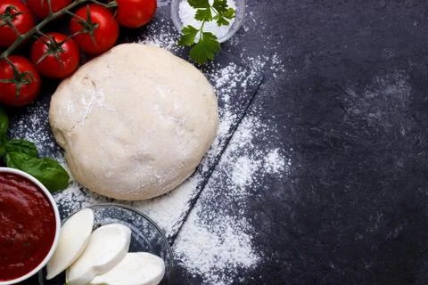 Raw dough for pizza Stock Photos