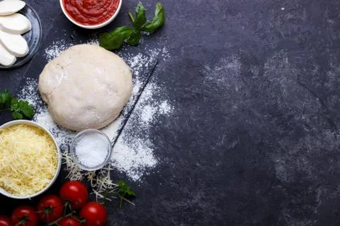 Raw dough for pizza Stock Photos