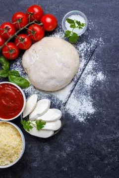 Raw dough for pizza Stock Photos