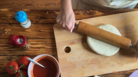Raw dough preparation or pizza with ingredient: tomato sauce and mozzarella Stock Footage 101369207
