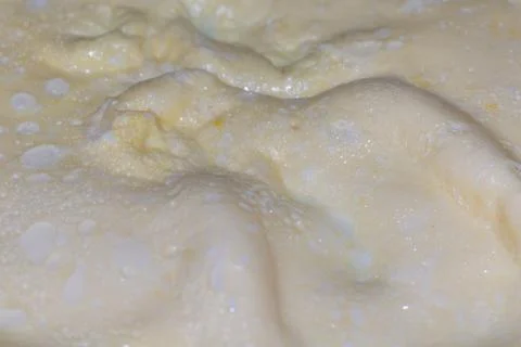 Raw dough texture with bubbles rising during the bread making process 스톡 사진
