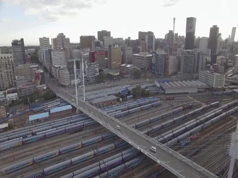 Raw drone shot o a pullback of  the Nelson Mandela Bridge 스톡 동영상 75826082
