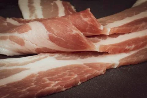 Raw dry-cured back bacon Stock Photos