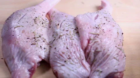 Raw duck legs on a kitchen table. Stock Footage 146138219