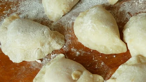 Raw dumpling with potatoes. Preparation dumplings on a wooden board. sculptin Video stock 140162561