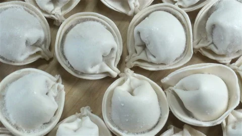 Raw dumplings close-up Stock Footage 140222324