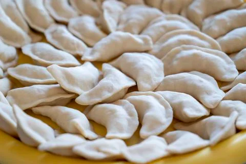 Raw dumplings close-up Stock Photos